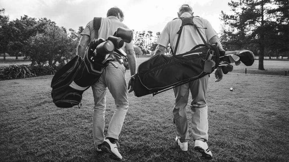 Golfer Carrying Bags (2)