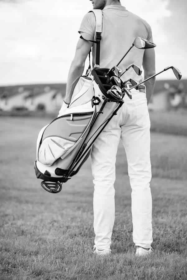 Golfer Carrying Bags 41