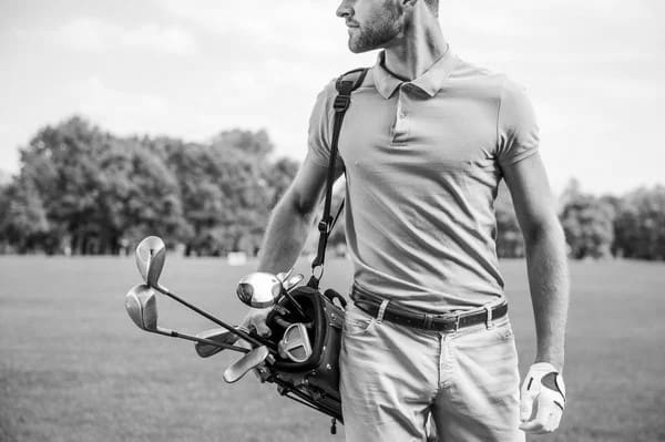 Golfer Carrying Bags 55