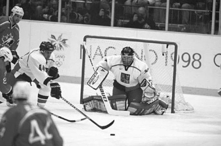 Hockey Goalie Stopping Shot