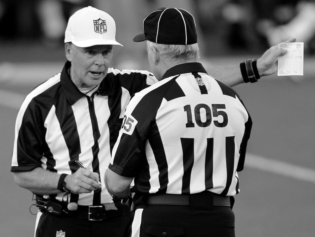 NFL Referee Throwing Flag 24